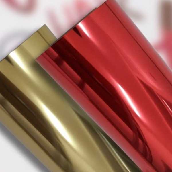 rolos filme de recorte dourado e vermelho metalizado